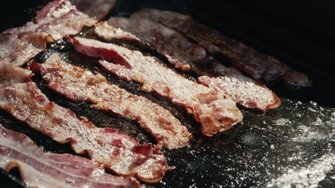 Bacon cooking on flat top Stock Footage 280602872