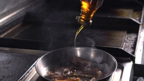 Bacon cooking slowmo adding maple surop Stock Footage 89202181