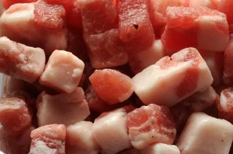 Bacon cubes background Stock Photos