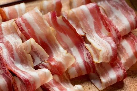 Bacon on cutting board Stock Photos