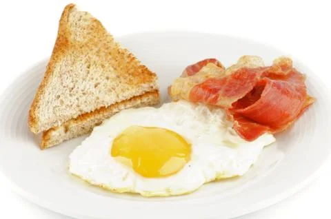 Bacon, eggs and toasts Stock Photos