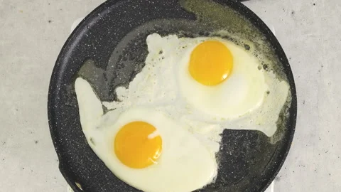 Bacon, eggs, cheese, and toasted bread. English breakfast recipe Stock Footage 225926871