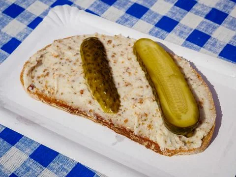 Bacon fat bread slice with Spreewald cucumber Stock Photos