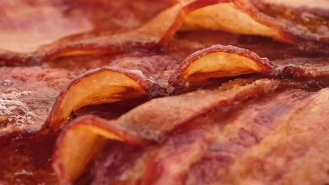 Bacon. fried bacon rotation close up Stock Footage 136028147