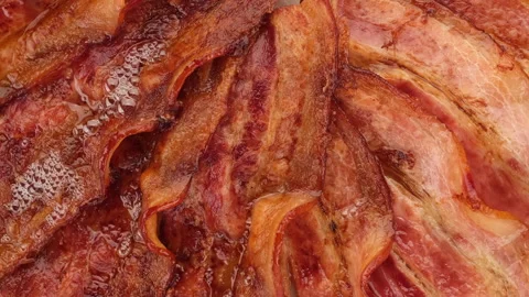 Bacon. fried bacon rotation close up Stock Footage 136029129