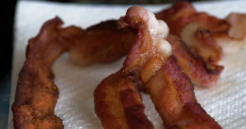 Bacon fried crispy piled high ready to eat close up Stock Footage 151001529