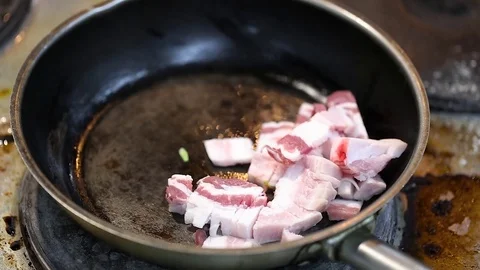 Bacon is fried in a pan Stock-Footage 76082492