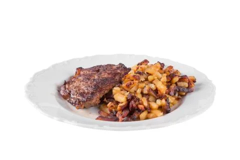 Bacon with fried potatoes Stock Photos