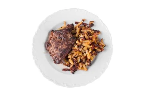 Bacon with fried potatoes Stock Photos