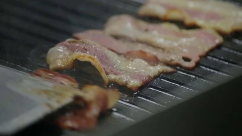  bacon fried on the stove Stock Footage 127201879