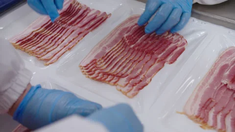 Bacon portioning with automatic weight control before being sent for packaging Stock Footage 205488763