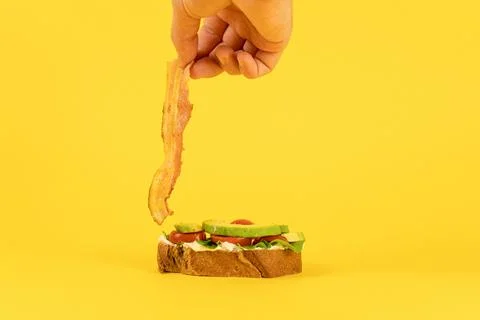 Bacon on sandwich bread. Stock Photos