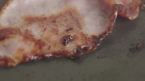 Bacon sizzling close up Stock Footage 266569309