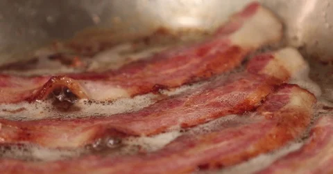 Bacon Sizzling In a Frying Pan Stock-Footage 71780291