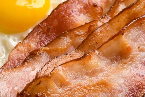 Bacon strips and egg Stock Photos