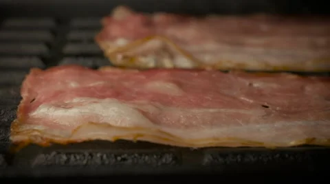 Bacon strips in frying pan. Stock Footage 57311630
