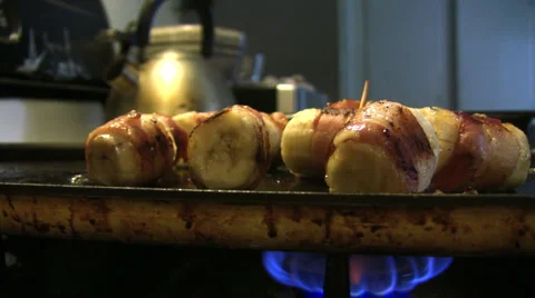 Bacon wrapped bananas 02 Stock Footage 2646138