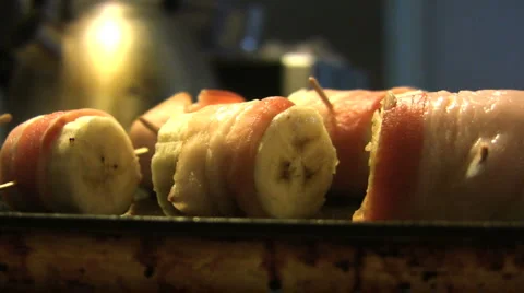 Bacon wrapped bananas Stock Footage 2646152