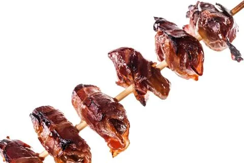 Bacon wrapped dates skewer Stock Photos