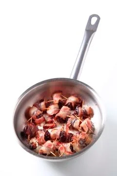 Bacon wrapped prunes Stock Photos