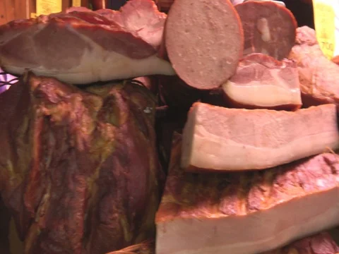 Bacon,ham at the butcher shop market Stock Footage