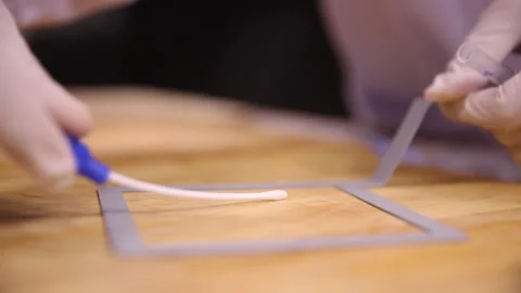 Bacteria detection of tabletop sampling on cutting board (1) Stock Footage 202153144