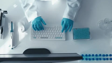 A bacteriologist works in a laboratory where the structure and properties of Stock Footage 267836009