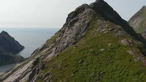 Bacwards drone shot of epic mountain Stock Footage 219569465