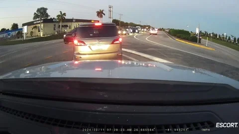 Bad Driver Gets Instant Karma, Cape Coral, Florida, USA - 11 Mar 2024 Stock Footage 332241295