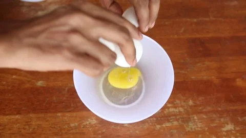 Bad egg yolk and good egg yolk Stock Footage 75657900