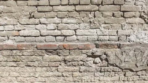 Bad foundations on old house cracked plaster facade wall with brick Stock Footage 110153032