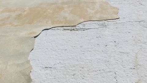 Bad foundations on old house cracked plaster facade wall with brick Stock Footage 110153461