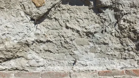 Bad foundations on old house cracked plaster facade wall with brick Stock Footage 110154931