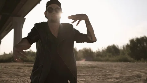 Bad guy. Stylish man in glasses emotionally dancing. Stock Footage 116393514