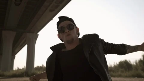Bad guy. Stylish man in glasses emotionally dancing. Stock Footage 116393682
