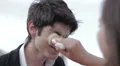 bad joke - girl spreads ice cream cone in the face of a boy - laughing HD Footage