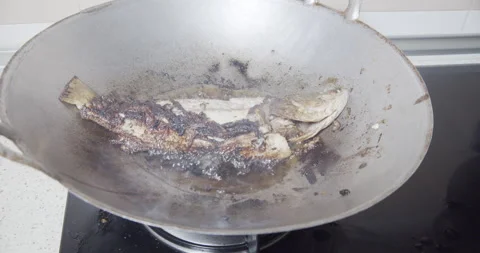 Bad looking fried fish Stock Footage 141261870