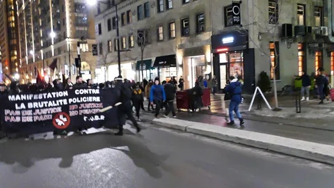 Bad protesters bringing trash container on fire Stock Footage 105353266