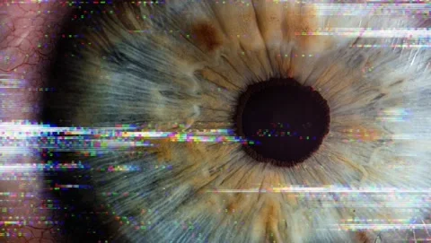 Bad reception close up of human eye Cinemagraph Stock Footage 142890537