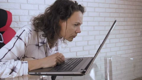 Bad seeing woman at the computer. Stock Footage 100304230