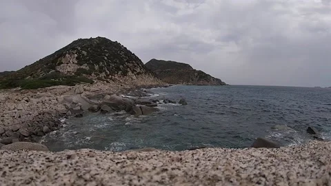 Bad weather on the coasts with strong wind and waves crashing on the rocks Stock Footage 158041791