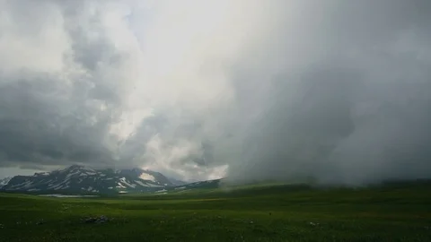 Bad weather in the mountains with storm clouds and fog Stock Footage 81726591