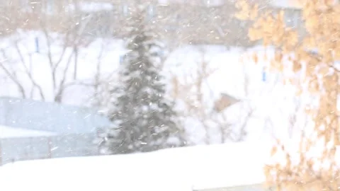 Bad weather, snow blizzard snowfall snowdrifts in the city, snowflakes swirl in Stock Footage 149396614