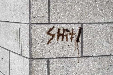 Bad word on the wall Stock Photos