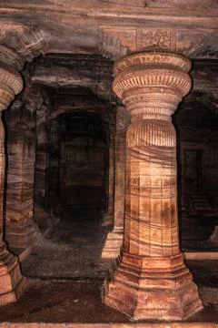 Badami cave temple interior pillars stone art in details 写真素材
