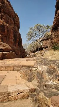 Badami Rocks with Green Trees in Karnataka India Foto stock