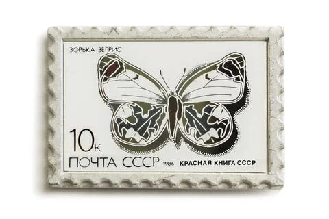 Badge features a Soviet postage stamp with a butterfly pattern. Inscription:  Stock Photos