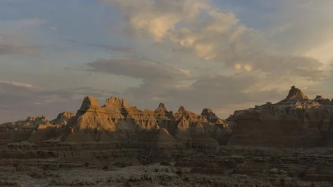 Badlands: Sunset on Mountains with Clouds Stock Footage 90526640