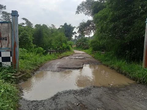 Badly damaged road Stock Photos