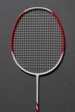 A badminton racket on a gray background 스톡 사진